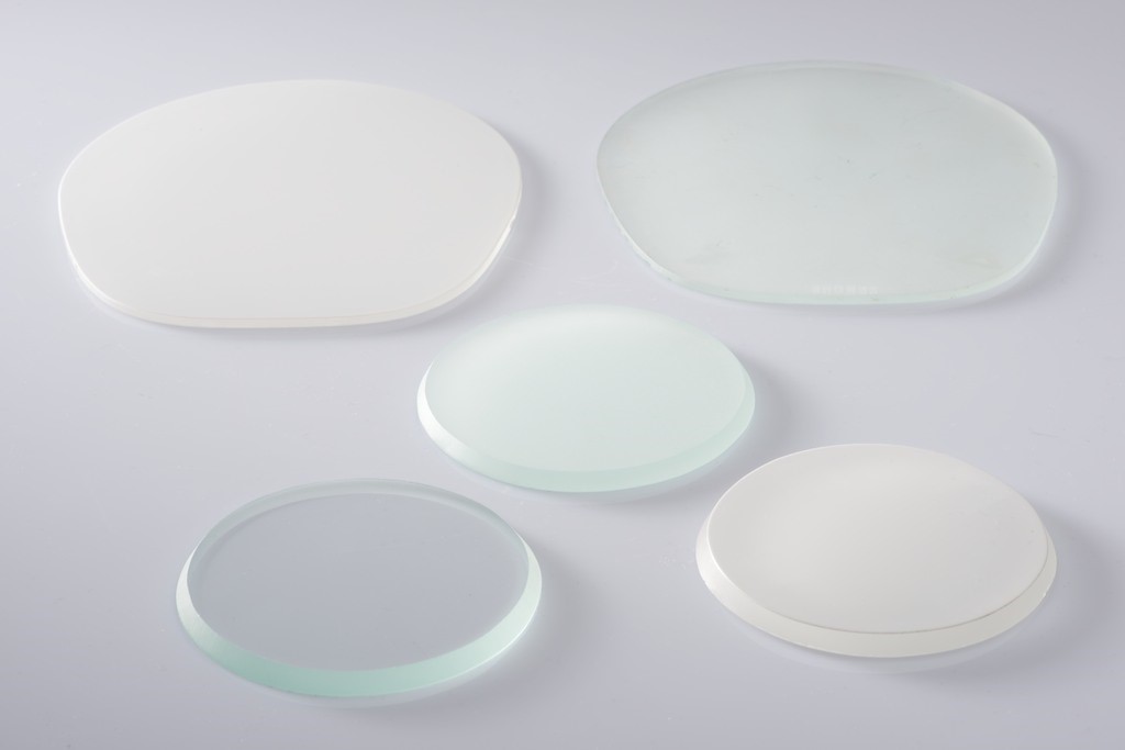 Sample discs of light diffusing milk glass