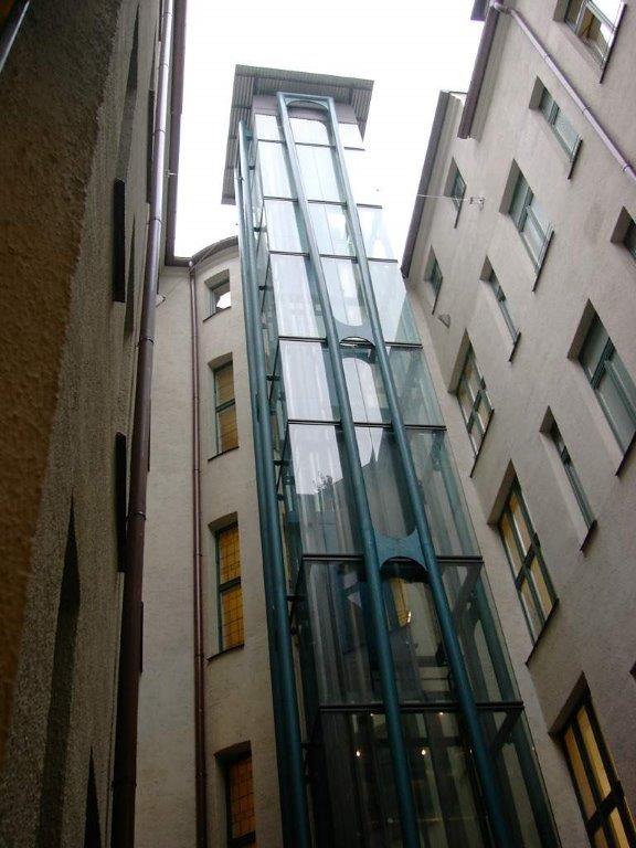 Special glass for exterior elevator construction